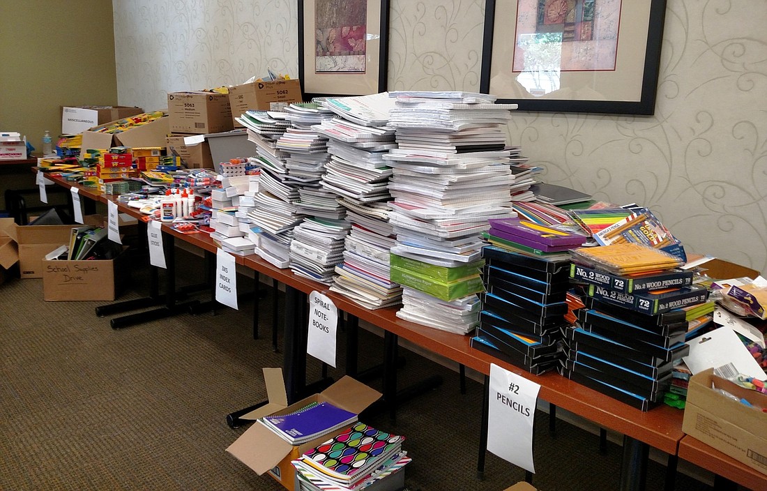 Piles of donated school supplies for The Jewish Federation of Volusia and Flagler County. Photo courtesy Florida Hospital.