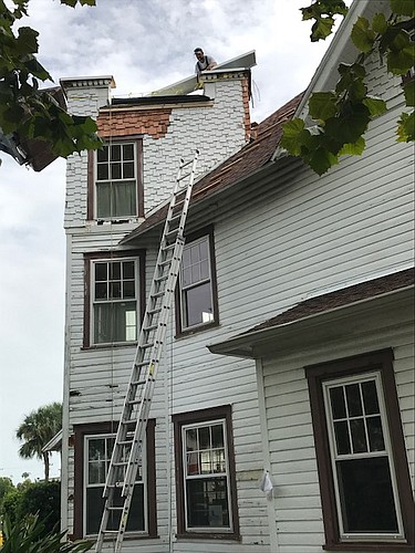 The roof was not leaking on the Stout-MacDonald House, and workers made sure it didn't start. Courtesy photo