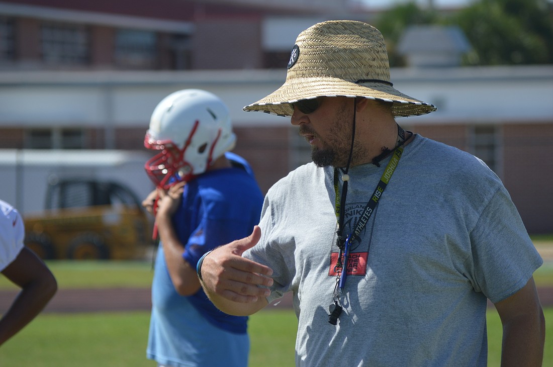 Seabreeze head coach Troy Coke coaches the team's offense, which will look to improve on a horrid 2017. Photo by Tim Briggs