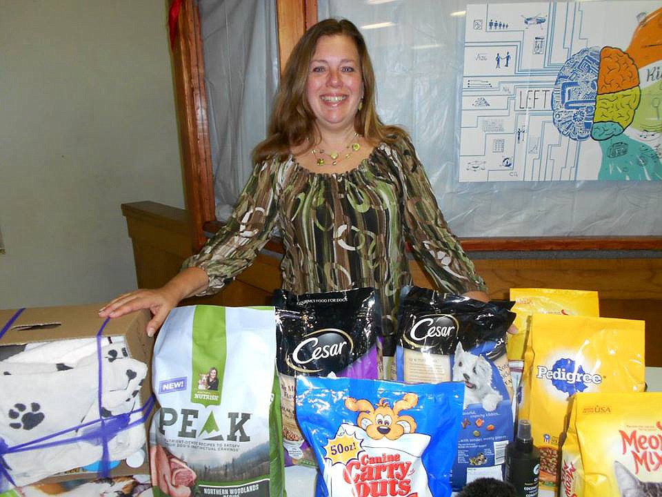 Lisa Smith stands with  some of the "gifts" she received for her 55th birthday. Courtesy photo