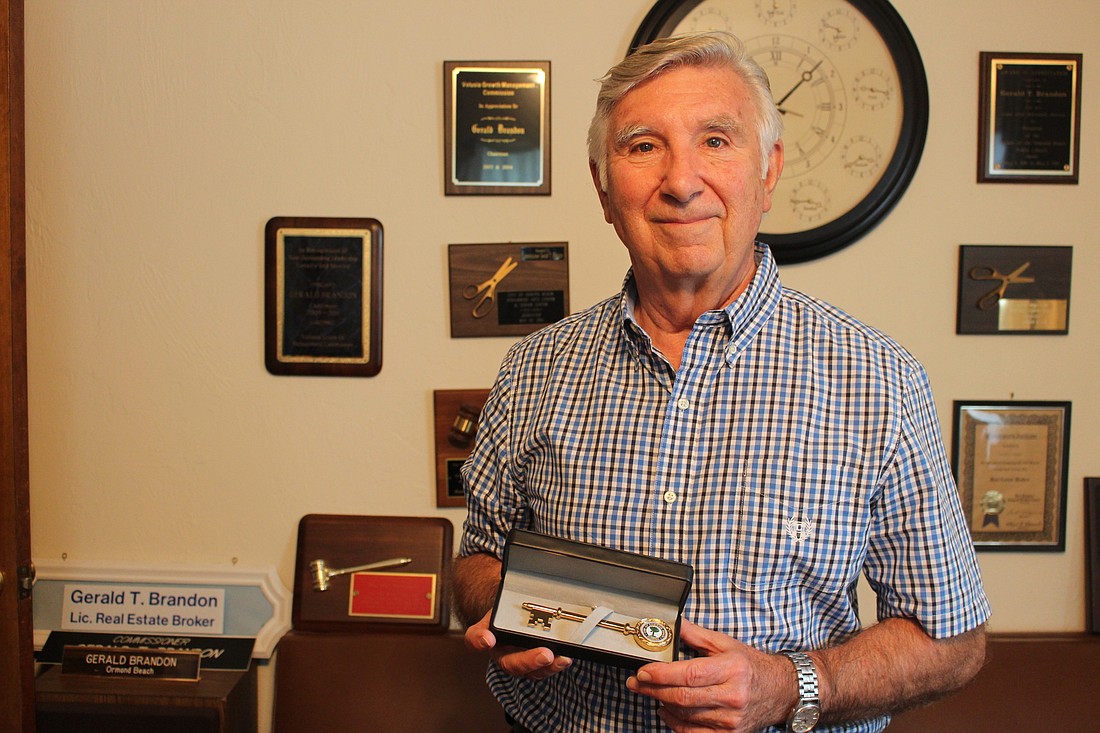 Gerald Brandon was presented with a key to the city for his 25 years of representing Ormond Beach on the Volusia Growth Management Commission. Photo by Jarleene Almenas
