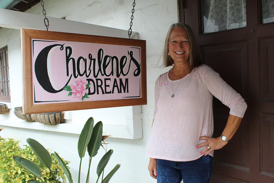 Cindy Thornton stands outside the Charlene's Dream cottage behind Seabreeze United Church of Christ. Photo by Jarleene Almenas