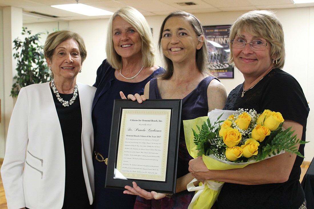 CFOB Chair Rita Press, Dee Boehm, Krista Boehm and Dr. Pamela Carbiener smile after the Citizens for Ormond Beach's membership dinner on Wednesday, Oct. 11. Photo by Jarleene Almenas