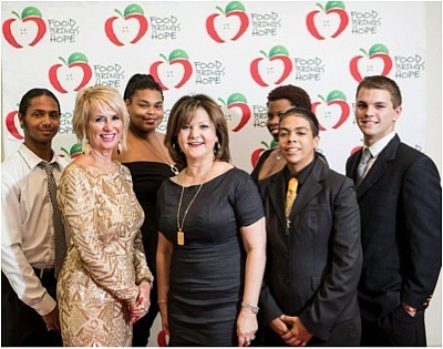 Johnny Fluitt, Judi Winch, executive director of Food Brings Hope, Sydney White, Forough Hosseini, founder and chair of Food Brings Hope, Jakyra McCloud, Sabrina Blue, and Donald Castellano at the fourth-annual Pearls of Hope Gala
