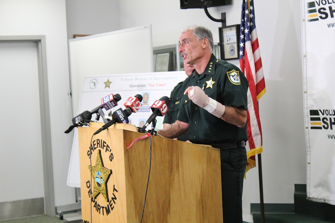 Sheriff Mike Chitwood discusses the results of Operation Tax Time during a press conference on Friday, Oct. 27. Photo by Jarleene Almenas
