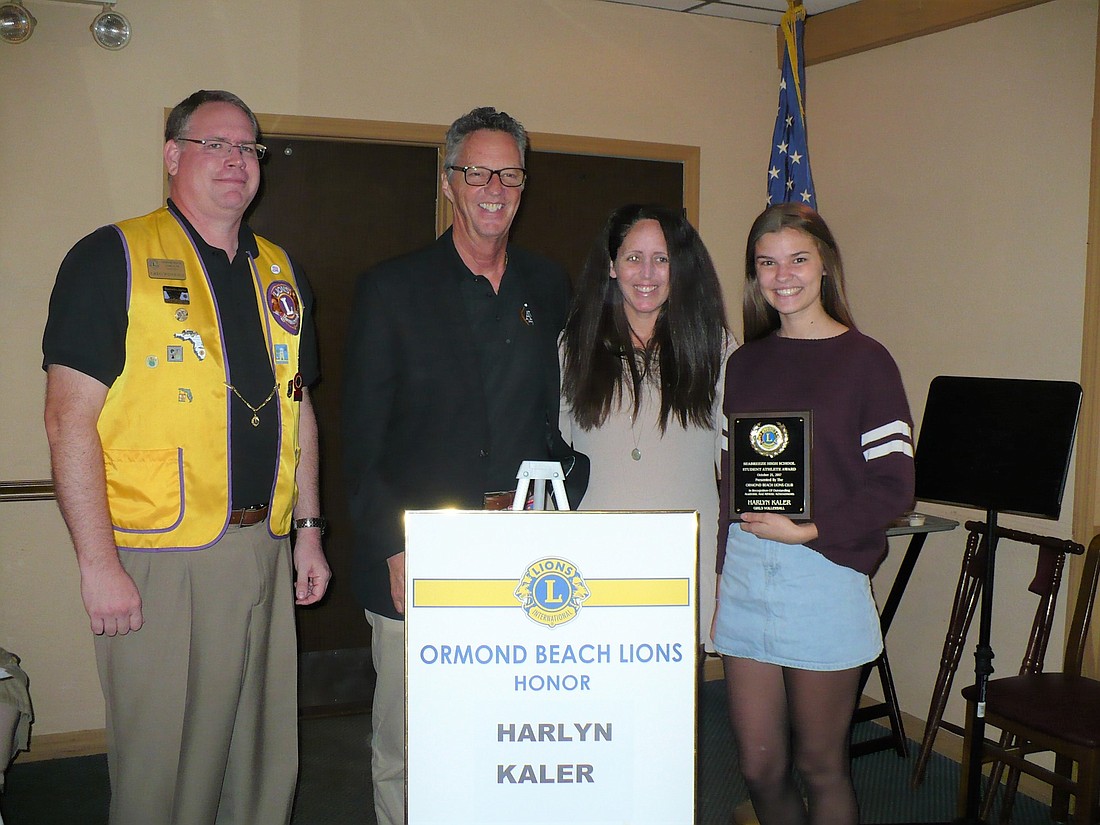 Lions Club President Greg Winquist, Seabreeze High School principal Joe Rawlings, Volleyball Coach Tarisa Craig and Harlyn Kaler during the Ormond Beach Lions Club on Oct. 25. Photo courtesy of the Lions Club
