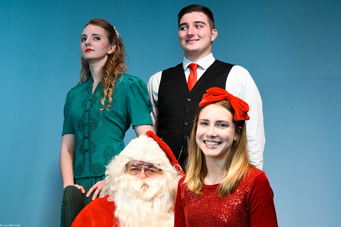 John Leonard as Santa sits with Susan, starring Julia Ambrose, as Grace Riley, who plays Susan's mom, and her love interest Fred, played by Johnathan Foege, look on. Photo courtesy of Mike Kitaif