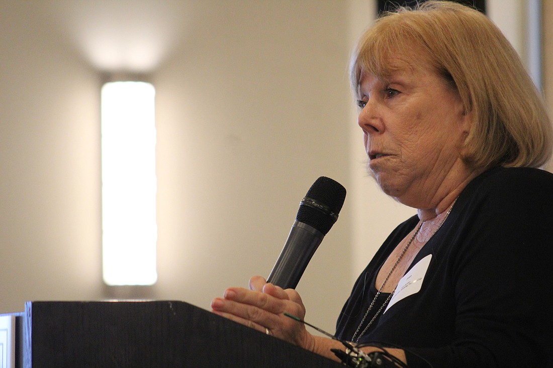 Fran Gordon, executive director for the Mid-Florida Housing Partnership, Inc., talks about affordable housing at the Jan. 12th Eggs and Issues program. Photo by Jarleene Almenas