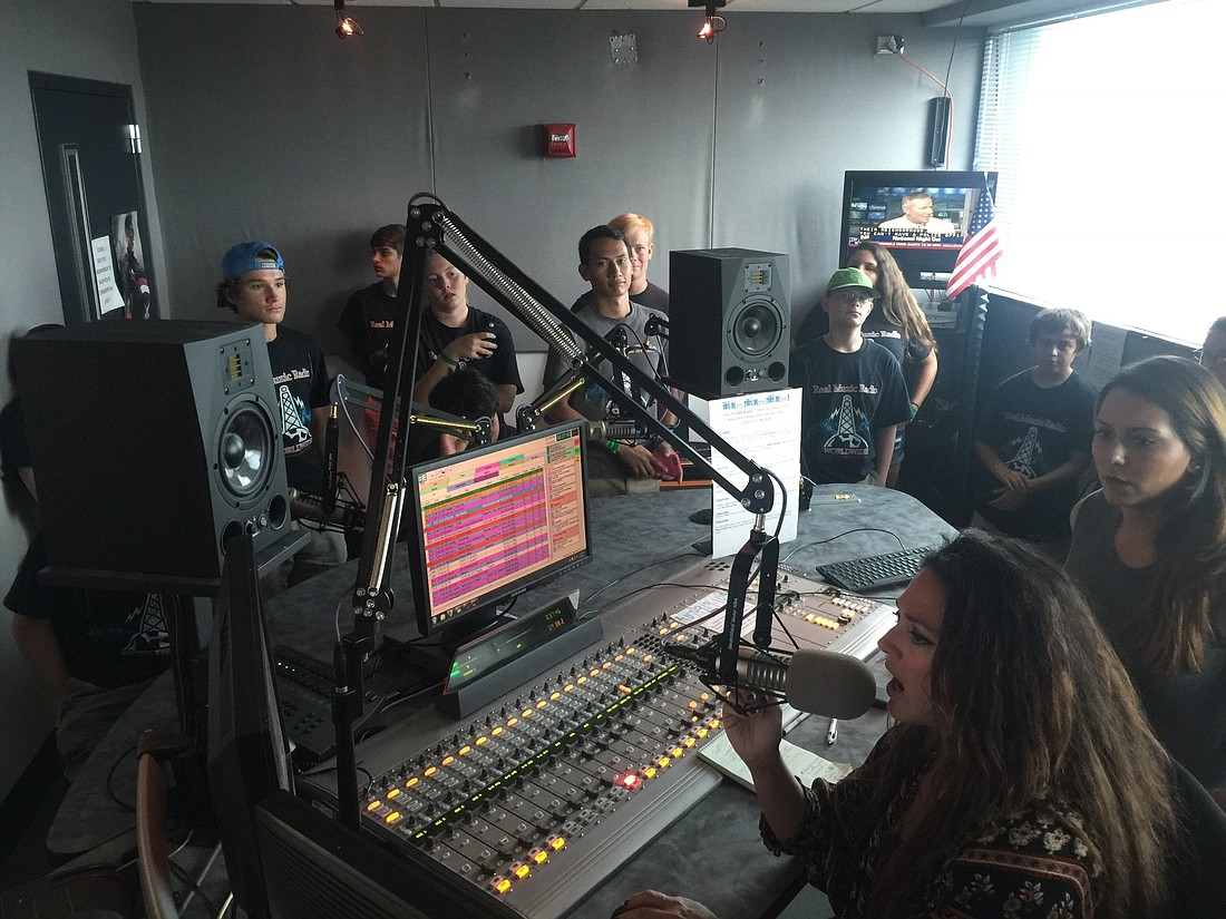 Justin Rovins' "Exploration in Communication" students at  the CBS radio station in Orlando. Photo courtesy of Justin Rovins