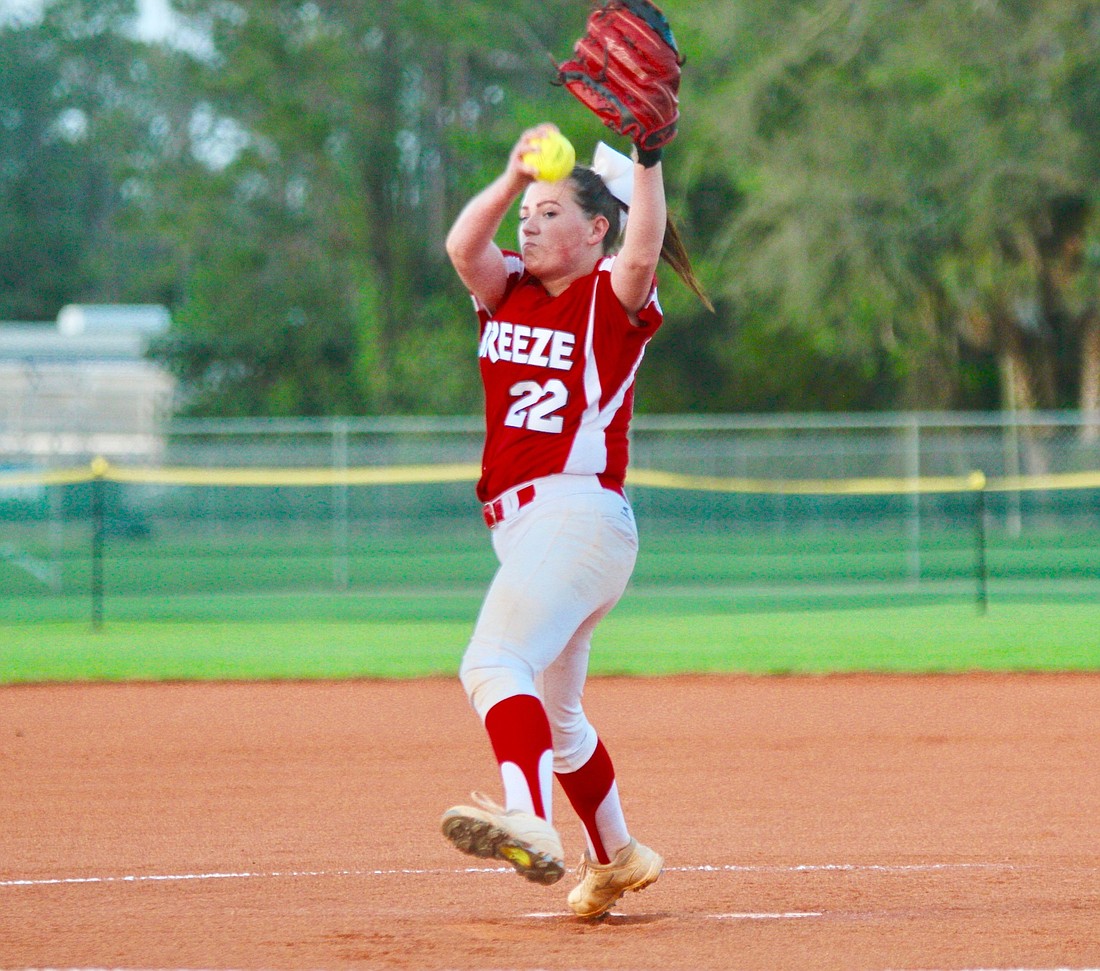 Sandcrabs pitcher Danielle Spaulding winds up to throw against Matanzas. Photo by Ray Boone