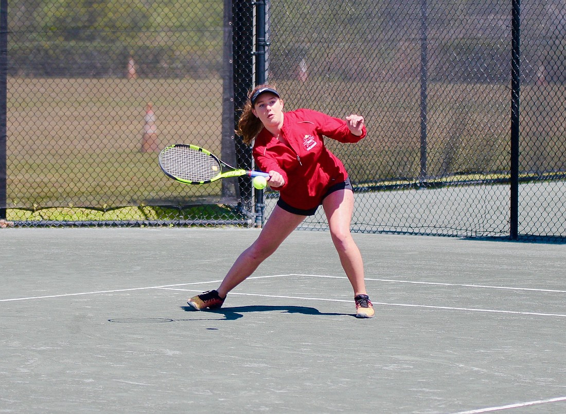 Seabreeze's Abby Okarski returns a shot in the Five Star Conference Championship. Photo by Ray Boone