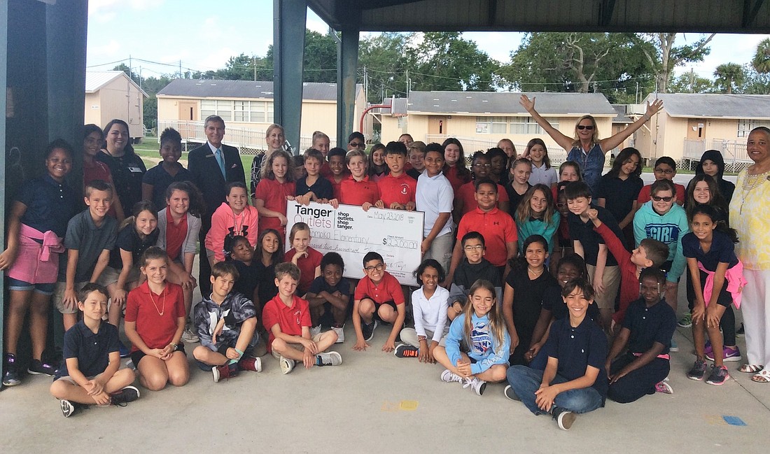 Tanger Outlets presents Tomoka Elementary with a $2,200 grant on Wednesday, May 23. Courtesy photo