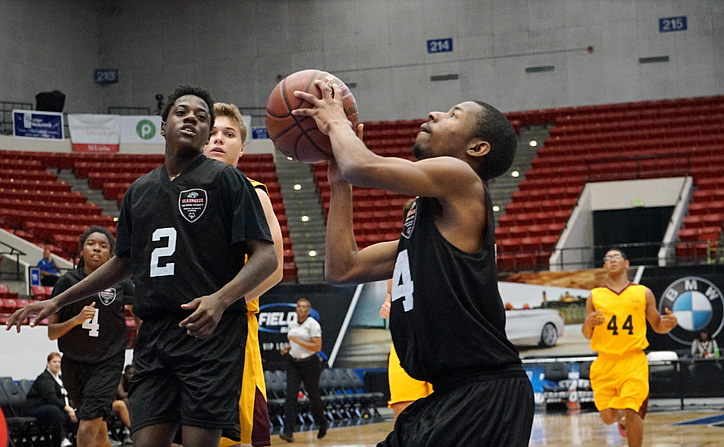 Jordan Wright shoots the ball during a game. Wright and unified partner Matthew Mundy have their own language on the court. Courtesy photo