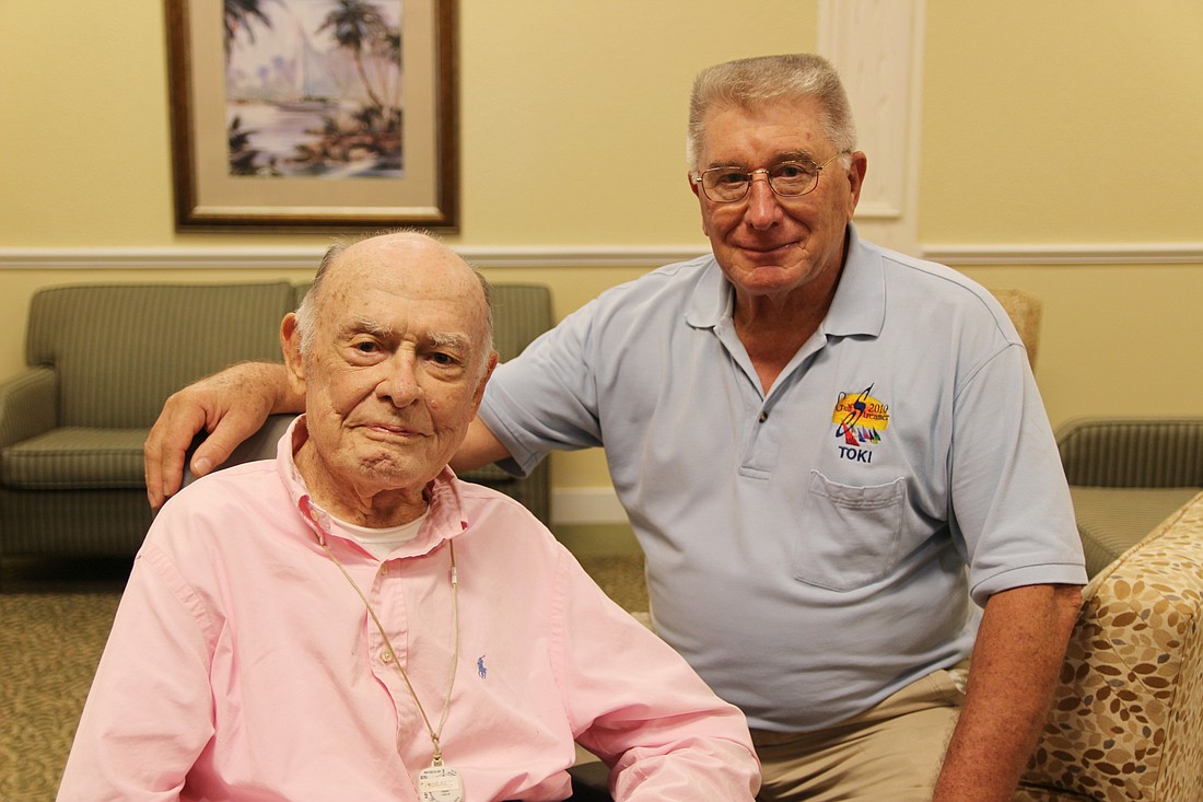 WWII Navy veteran Addison "Mr. Mac" McNair with Dennis Gorden.