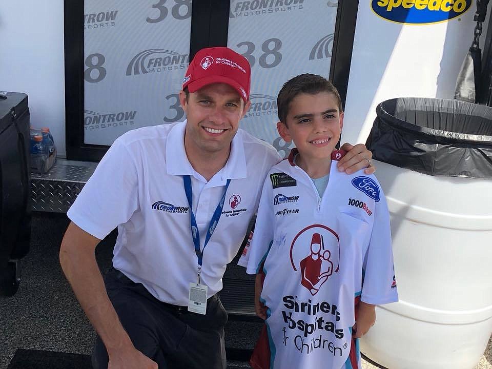 NASCAR driver David Ragan and six-year-old Theodore Koulouris during pre-race events on Saturday, July 7. Courtesy photo