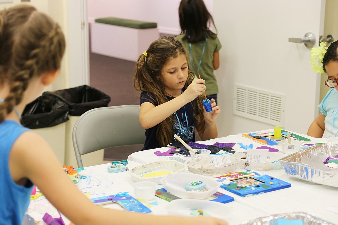Christina Stafford during OMAM's Bling Fling: Mermaid Camp on Tuesday, July 31. The summer camp is one of OMAM's art outreach opportunities. Photo by Jarleene Almenas