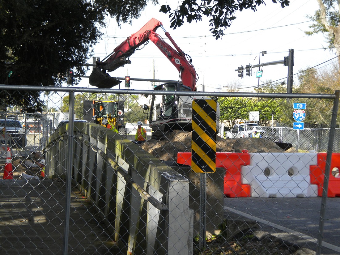 Workers installed new water main pipes and continue to work on bridge structure. Photo by Tanya Russo