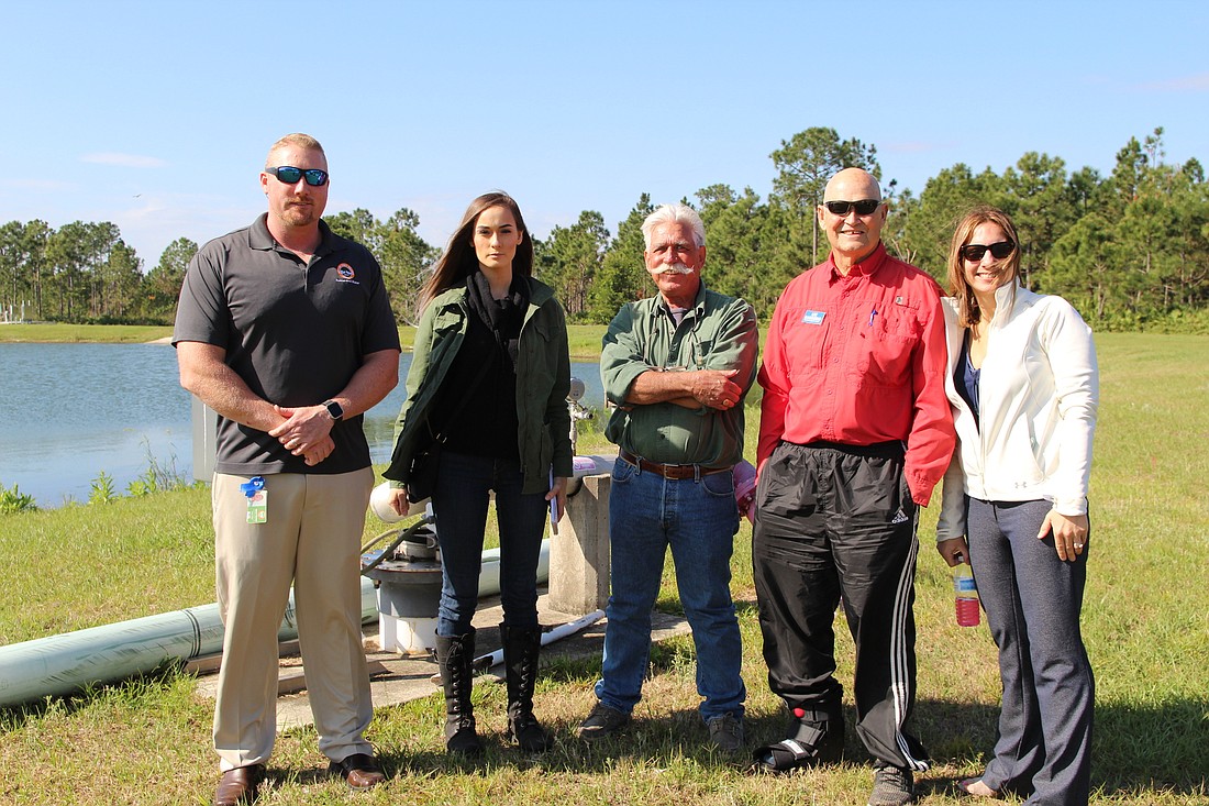 Steve Parnell, Savannah Weaver, Paul Rozar, Lee Barreiro and Port Orange PIO Christine Martindale at the reclaimed water lakes. Photo by Tanya Russo