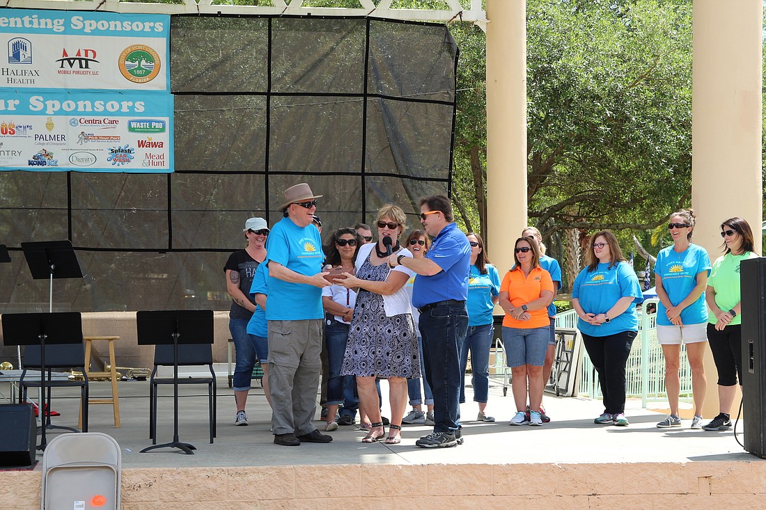 Former City Manager Ken Parker, Marilyn Ford, Don Burnette and the Port Orange Family Days Community Trust Board. Photo by Tanya Russo