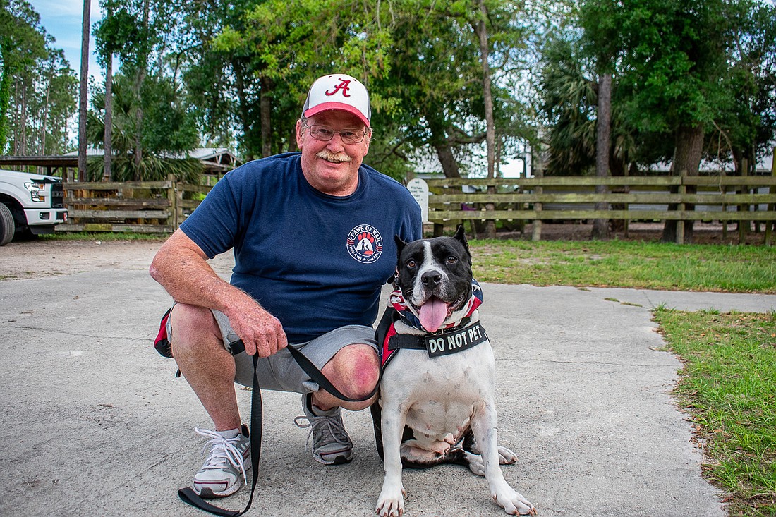 Eddie Johnston and his service dog Roxy. Photo by Kaitlin Sargent