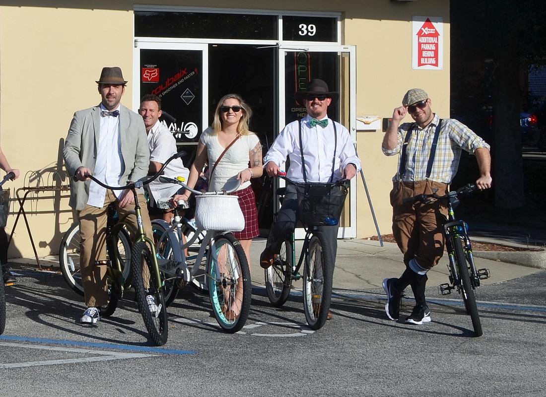 The Sandy Cyclers choose a theme for each ride. For the Feb. 20 ride, it was 'Tweed,' featuring clothes of the 1920s and 1930s. Photos by Wayne Grant