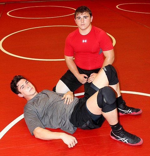 Senior Matt Kohler (lying) and Braden Buswell hope to carry the Sandcrabs to the state finals. Photos by Jeff Dawsey.