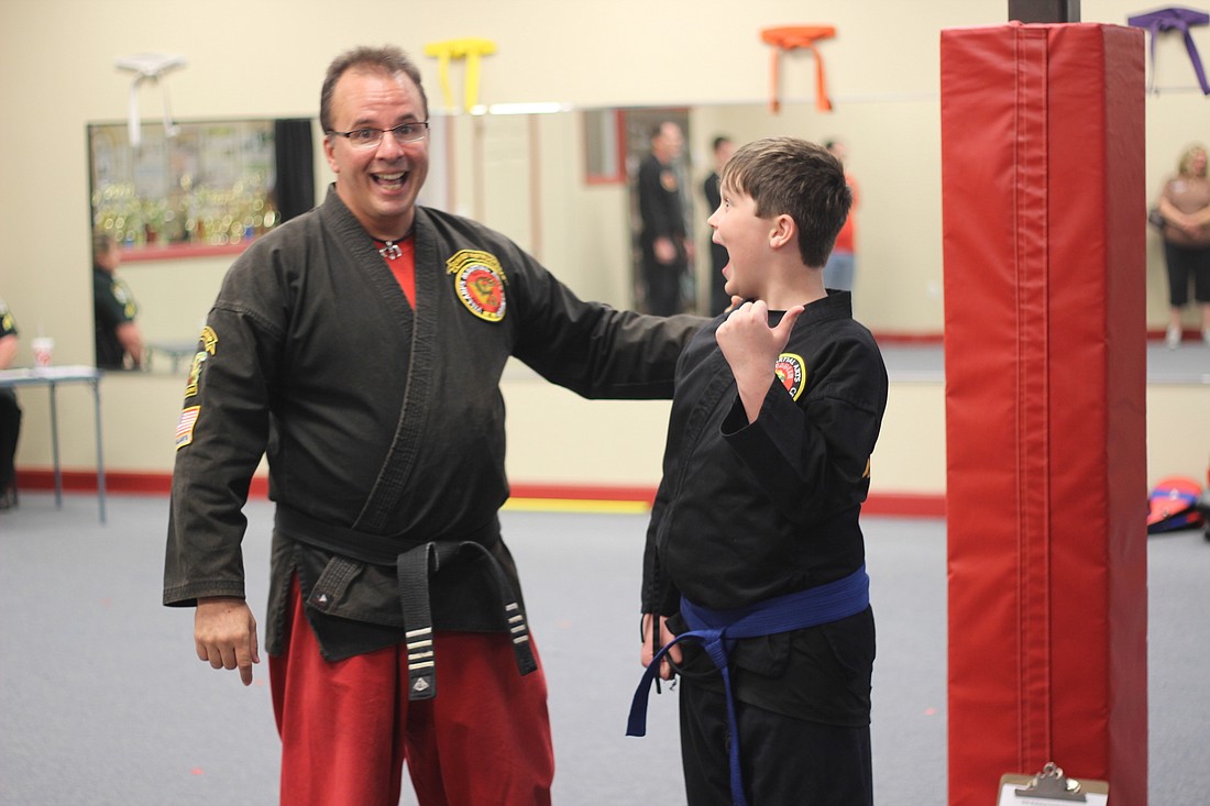 The look on 10-year-old Adam Hillyard's face was priceless when asked if he thought he could bully Sensei Dave (Photo by Emily Blackwood).