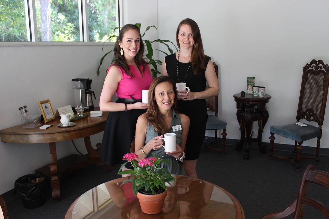 Come enjoy a cup of coffee with museum staff Melissa Frankel, Kristin Heron and Nicole Dominguez (Photo by Emily Blackwood).