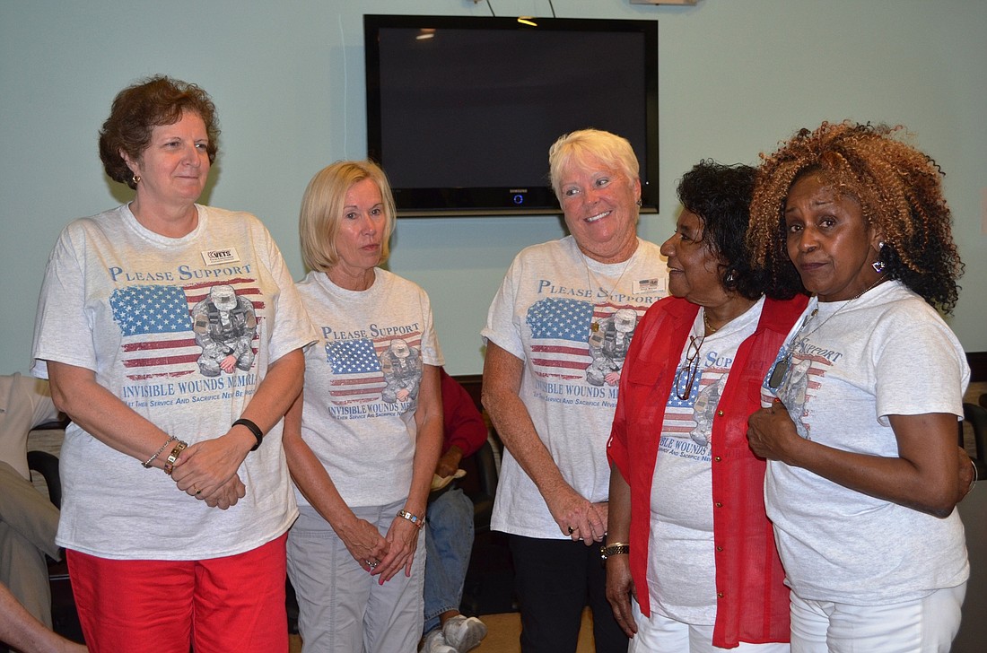 The Remembering Vets committee, Vicki Leignadier, Morgan Miller, Janie Rocke, Susan Banks and Cathy Heighter, chief executive officer, work on many projects to support veterans.Photo by Wayne Grant