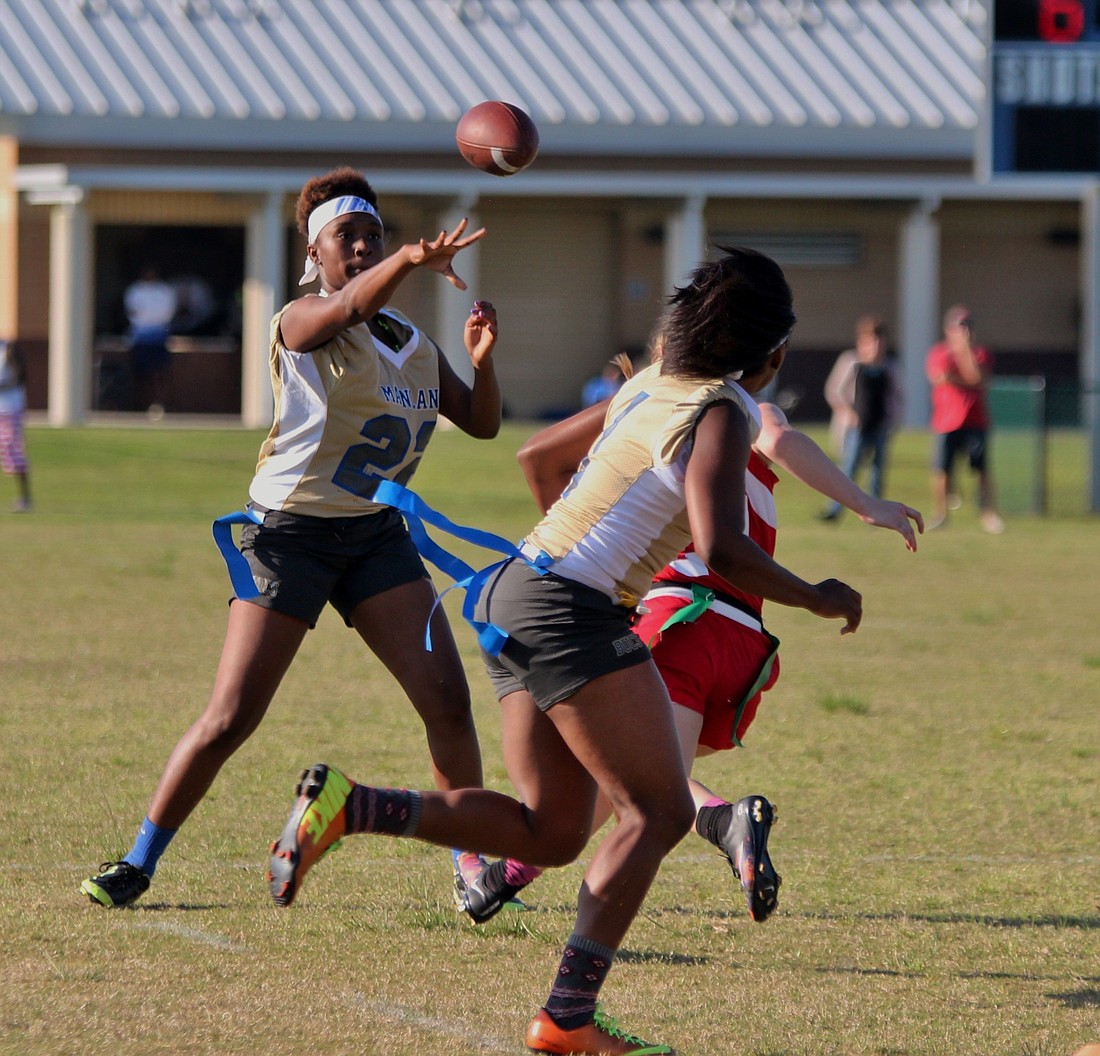 Tahara Williams finds Michella green wide open in the middle of the field for a first down. File photo