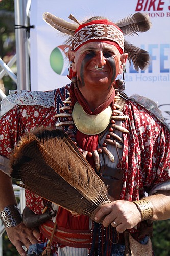 Chief Tomoka opened the triathlon festivities with a Native-American ritual dance routine. Photos by Hugh Driscoll