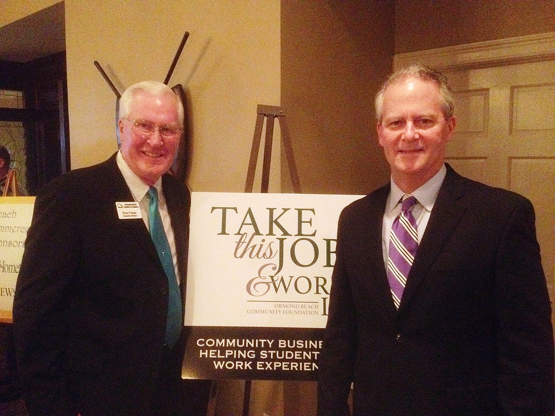 Dwight Selby, of Selby Realty, kicked off the Take This Job and Work It program earlier this year. At left is Chamber of Commerce Executive Director Rick Fraser.File photo