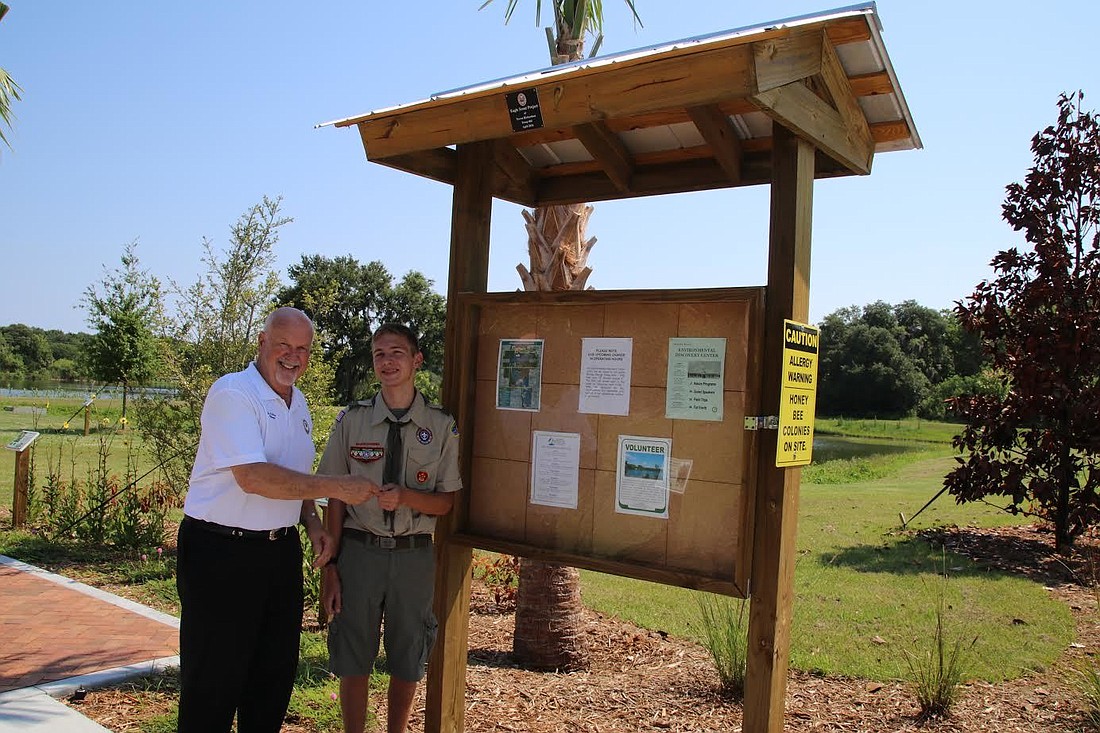 Mayor Ed Kelley â€” a former Eagle Scout â€” congratulated Trevor Richardson for his project (Courtesy photo).