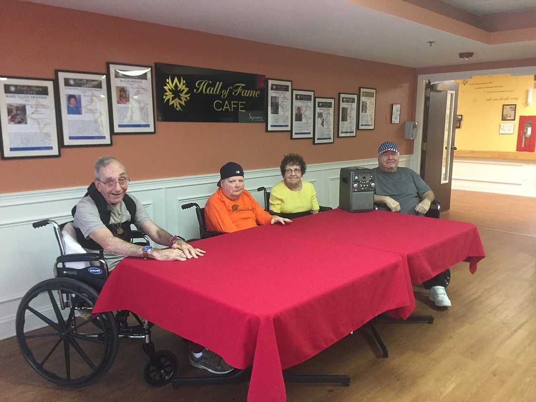 Mike McClelland, Andrew LaMura , Ellen Deising and Ken Krimmel are just a few of the residents who would love a karaoke machine (Photo by Emily Blackwood).