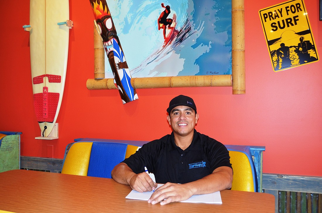 Jose Cifuentes gets ready to open his new restaurant, Jimmy Hula's.