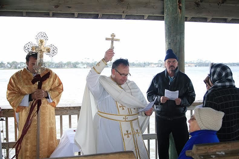 Reverend Vincent Brady blessed the Halifax River (Courtesy photo).