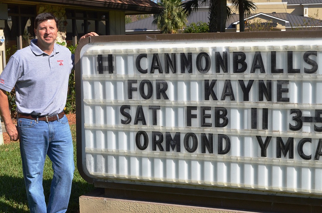 Drivers learn about current events by reading the the Ryan Ochipa State Farm sign on West Granada Boulevard. Photo by Wayne Grant