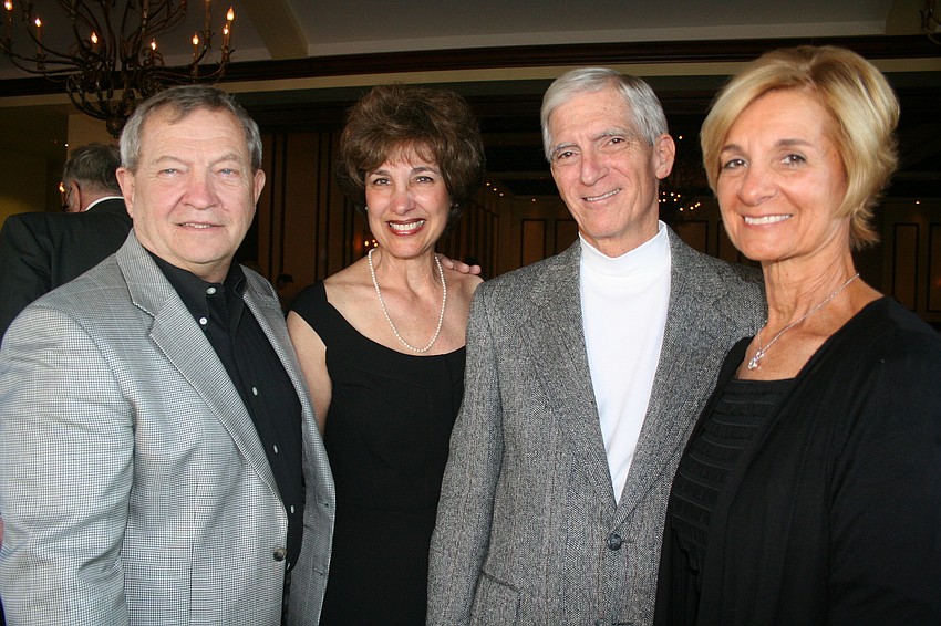 Sen. Mike and Dee Bennett with Dr. Brian and Chairwoman Kris Murphy