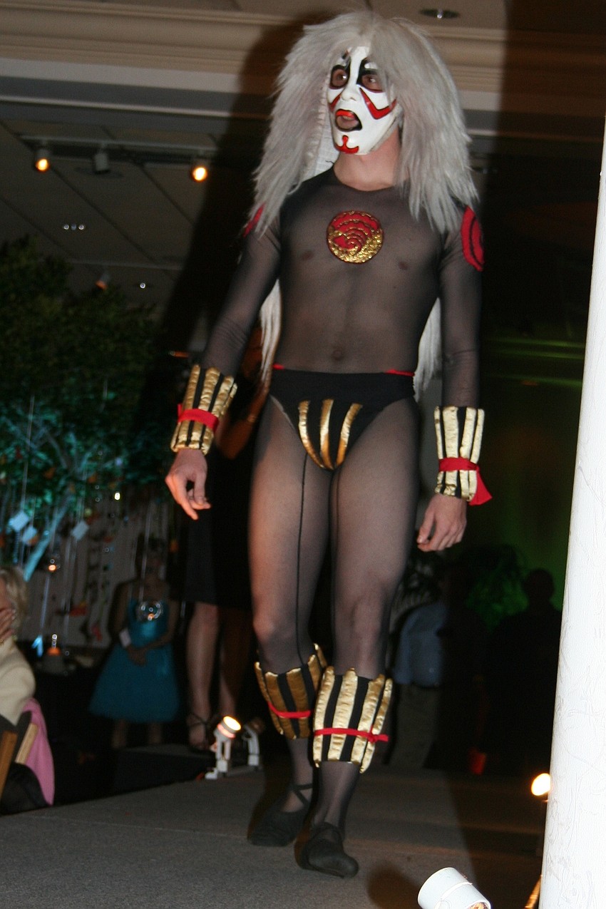 Dancers modeled costumes in a runway 