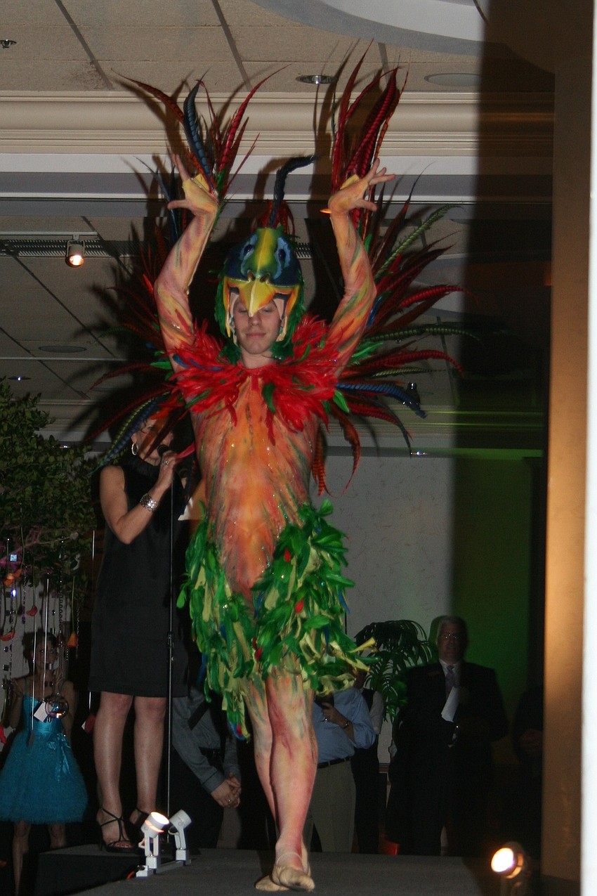 Dancers modeled costumes in a runway 