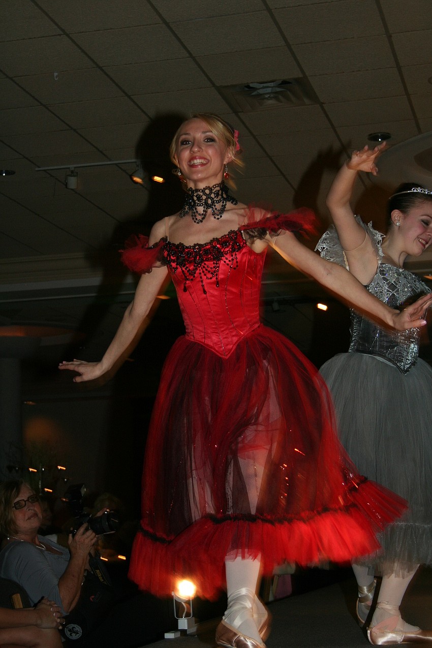 Dancers modeled costumes in a runway 