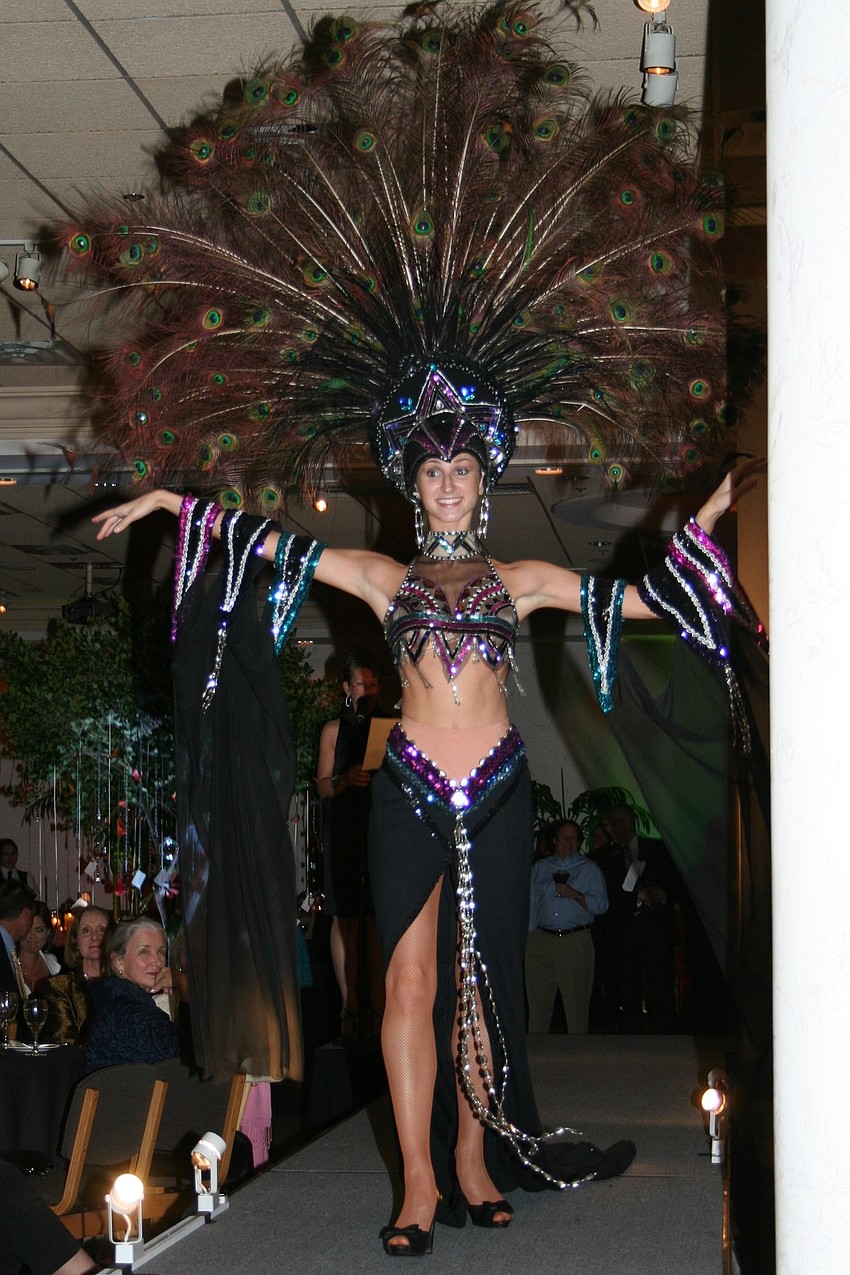 Dancers modeled costumes in a runway 