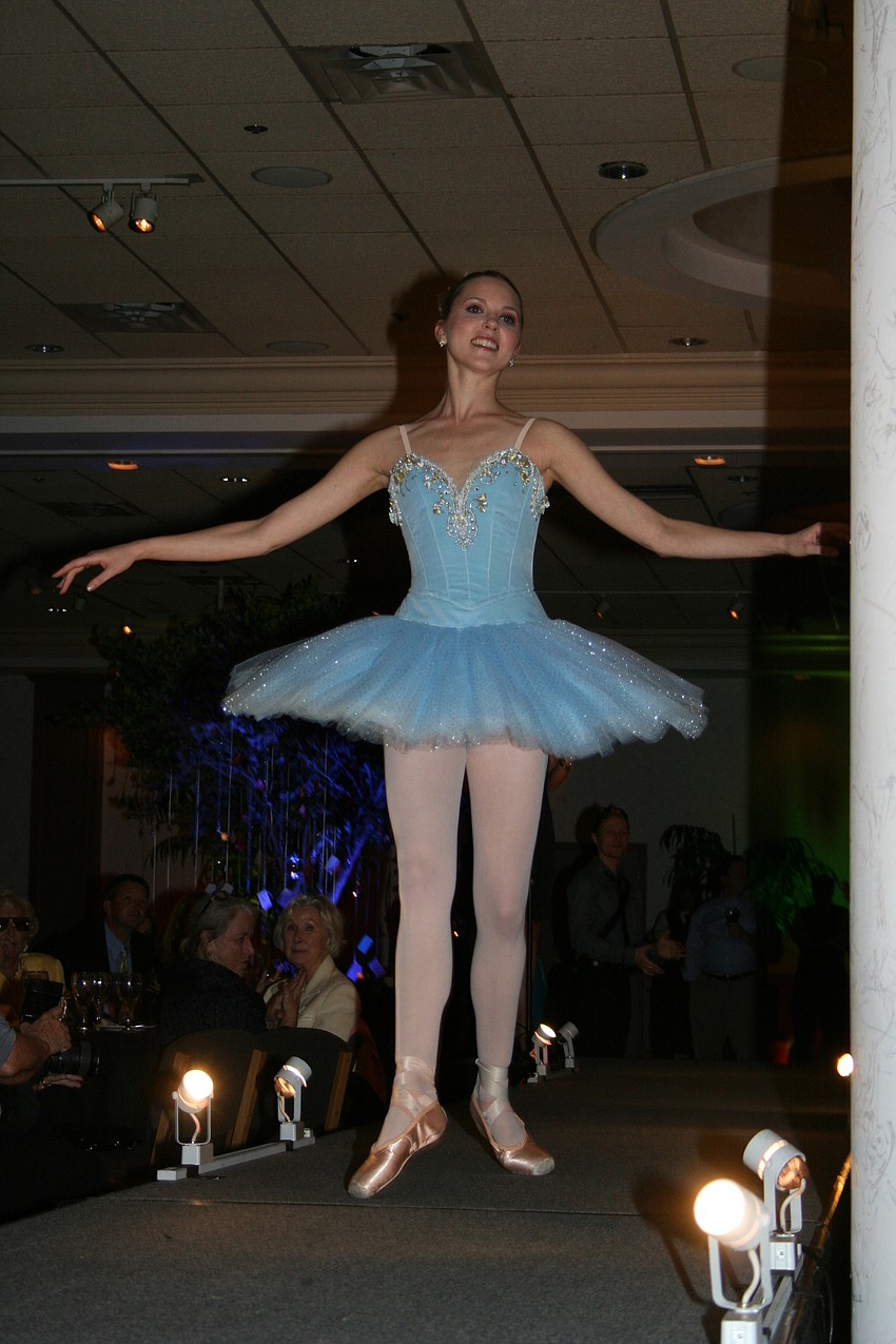 Dancers modeled costumes in a runway 