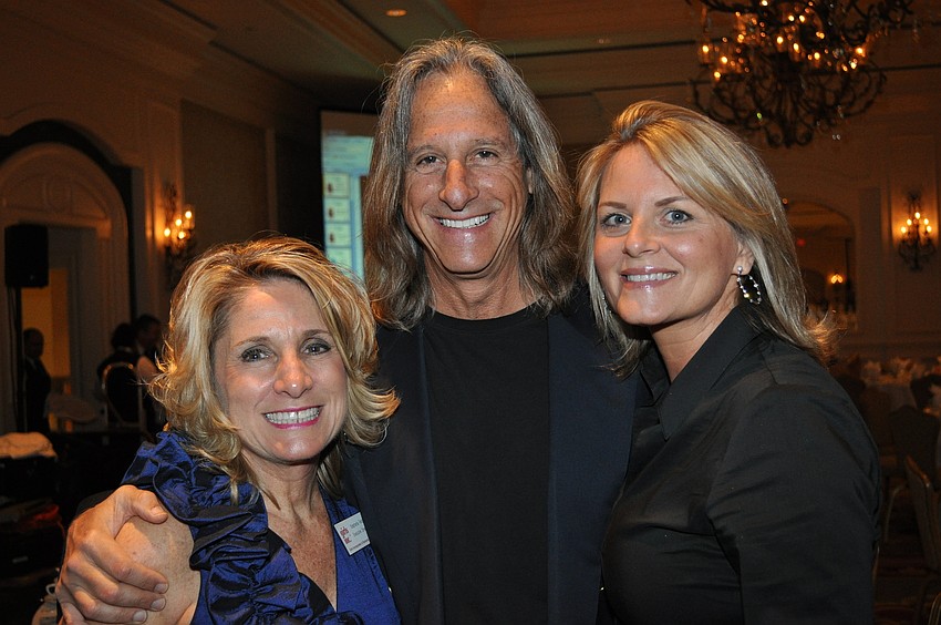 Stephania Feltz with Robert and Shannon Warren