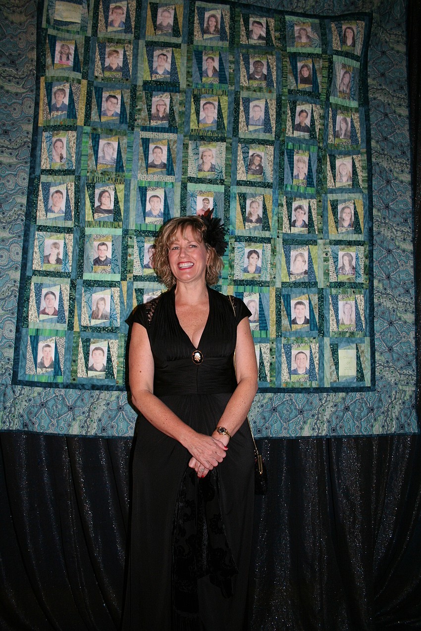 Kate Hawkins and this year's senior class quilt