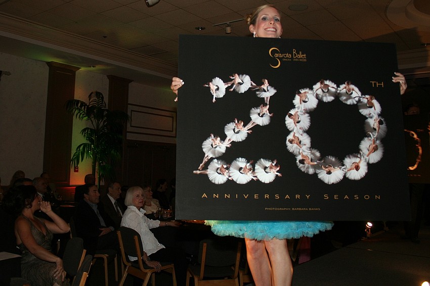 Kate Honea and 20th Annivesary logo, female