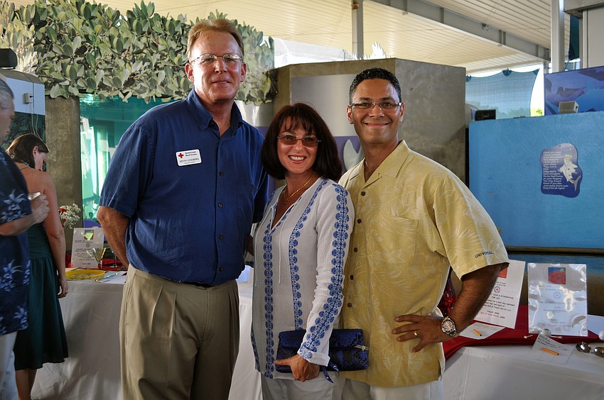 American Red Cross Executive Director Kevin Lindberg with Donna and Rick Espino