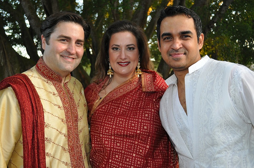 Tom and Allison Luzier with designer Bibhu Mohapatra