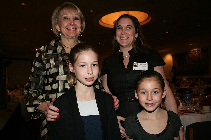 Cochairs Andrea Sukin and Michelle Colburn with Caroline and Chloe Colburn