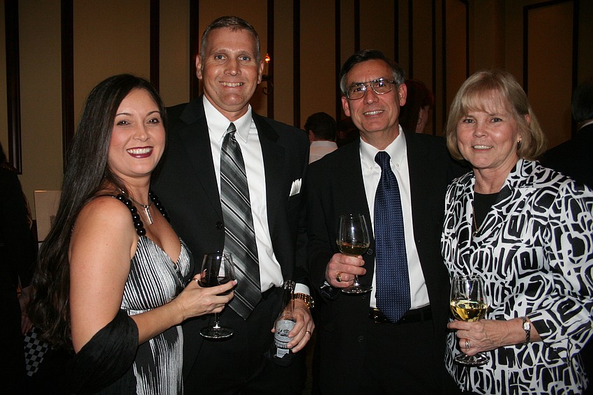 Lupita and Rick Wells and Tom and Terry Salisbury